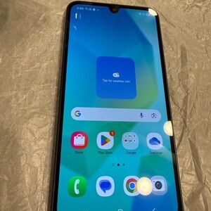 Samsung Smartphone with Black Frame and Blue Screen